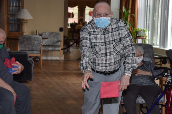 Our safe senior living experience included cornhole games